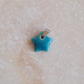 Colgante estrella de cerámica esmaltada turquesa